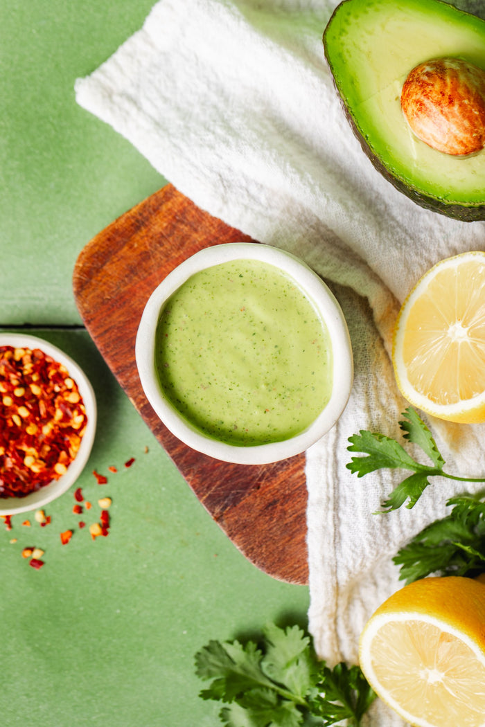 Avocado oil, avocado, citrus, herbs, garlic, and spices